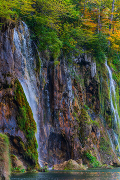 Waterfalls flowing into the karst lake