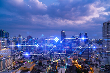 Information flow hologram, night panorama city view of Bangkok. The largest technological center in Asia. The concept of programming science. Double exposure.