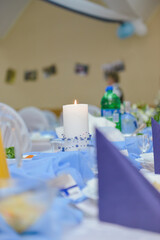 Beautifully decorated wedding table and other details at wedding hall. Wedding day.
