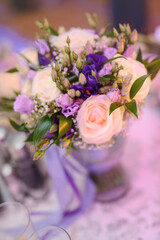 bouquet in the hands of the bride