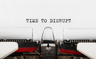 Text Time to Disrupt typed on retro typewriter