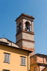 Fototapeta na wymiar Bell tower of the medieval church of San Salvatore in Lucca downtown, Tuscany, Italy, Europe.