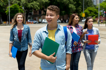 German male student with group of young adults