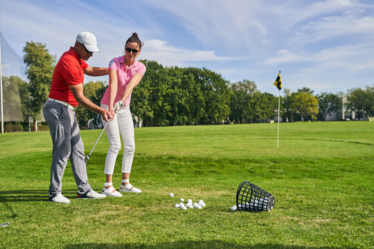 Caucasian Beginner Golfer Learning The Game Basics