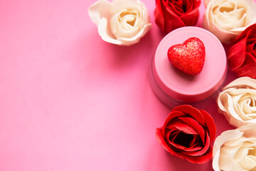 roses and heart, romantic decorations on a pink background, copy space - 386616598