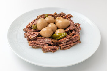Stewed pork on a white background