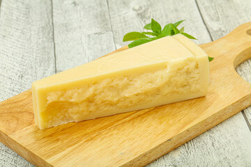 Hard parmesan cheese served basil