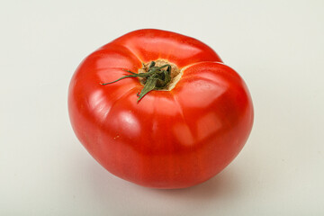 Ripe big juicy red tomato