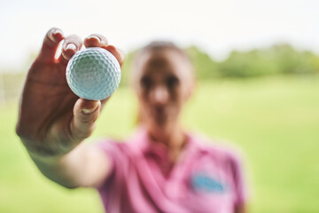 Caucasian golfer in a polo shirt standing outdoors