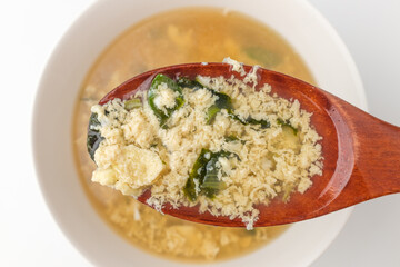 Egg soup on white background
