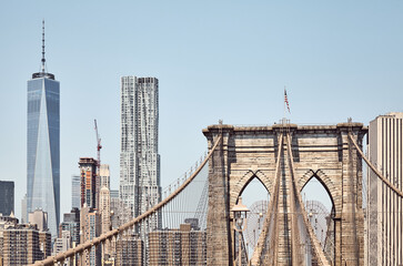 Brooklyn Bridge with Manhattan skyline in background, color toning applied, New York City, USA.