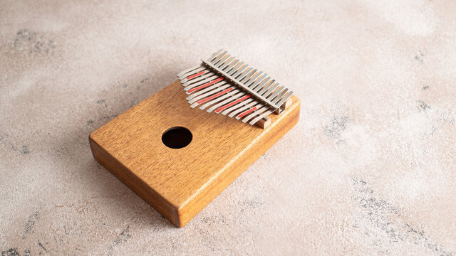Kalimba, mbira, finger harp, gourd piano,, kilembe, likembe, likimba, marimbula, sansa, sansu, sanza, thumb piano