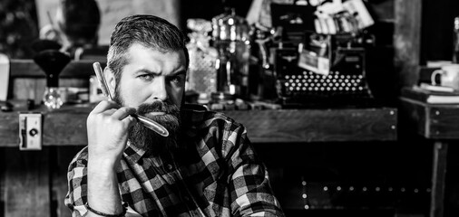 Portrait of stylish bearded man. Barber man with straight razor. Barber shop. Vintage barbershop, shaving.