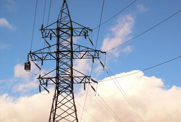 Power transmission tower against the sky. Electric power for transfer power by electrical grids. High voltage electric.