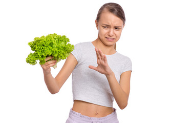 Beautiful young teen girl holding holding green salad, isolated on white background