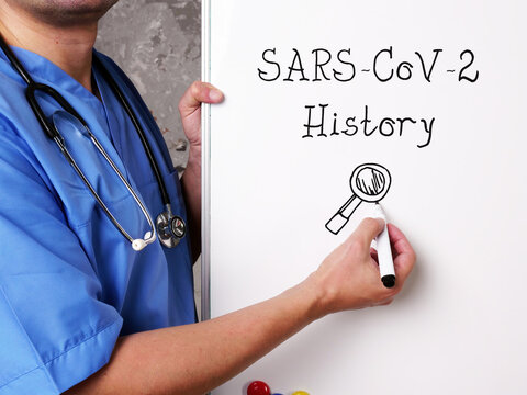 Medical Concept About SARS-CoV-2 History With Phrase On The Sheet.