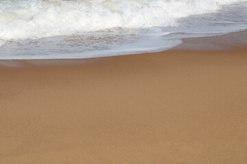 waves on the sand in a desert  beach