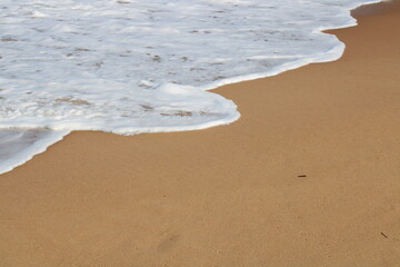 waves on the sand in a desert  beach