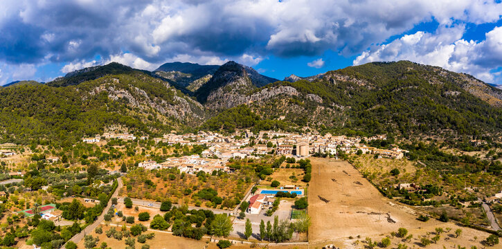 Aerial view, the village of Caimari municipality of Selva on the edge of the Tramuntana mountains with agriculture, center of the island, Mallorca, Balearic Islands, Spain