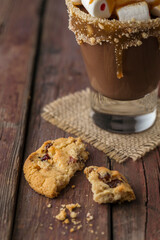 Hot chocolate on rustic wooden table