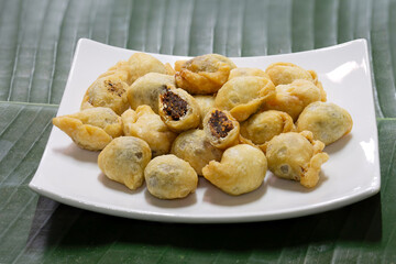 Fried flour molding thai ancient dessert which has fish filling stuffed, (Thai called 