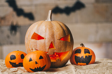 Halloween Jack-o-Lantern Pumpkins on paper background stock photo