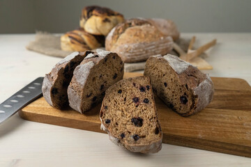 Sliced bread on a table on a wooden board Fresh pastry