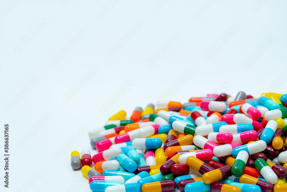 Wall mural pile of colorful capsule pills. pharmaceutical industry. healthcare and medicine background. pharmac