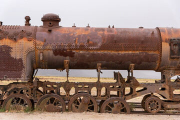 Old rusty locomotive abandoned in a train cemetery. Uyuni, Bolivia