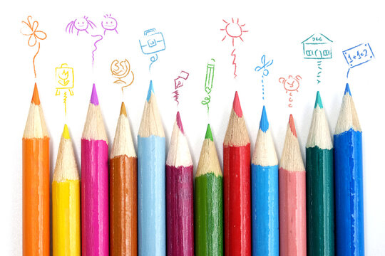 Group of coloured pencils and cute icon of back to school isolated on white background.