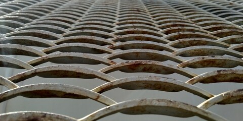 detail of tiles. metal rouletting for making metal walkways