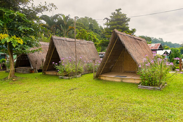 Fototapeta na wymiar Chiangmai, Thailand - October, 10, 2020 : Bamboo hut, thatched roof in rural areas in farmland for visitor at Chiang Mai, Thailand.