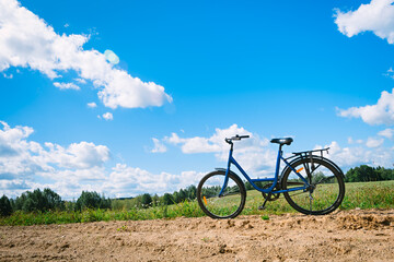 Fototapeta na wymiar Bicycle on the background of beautiful nature countryside