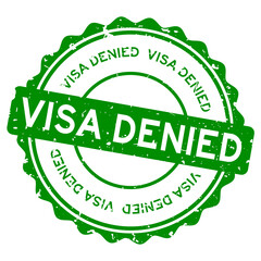 Grunge green visa denied word round rubber seal stamp on white background