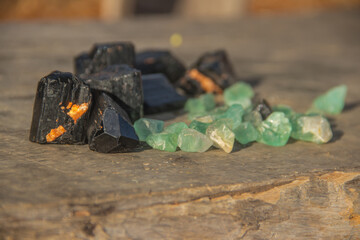 Green and black gem precious stones from illegal's minefields in Mozambique 
