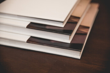 Beautiful white linen high end photo coffe table books with thick pages