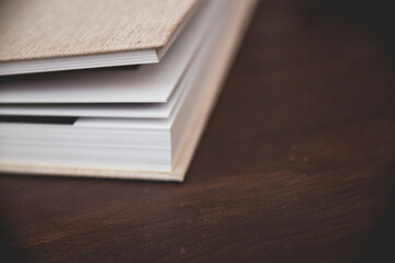 Beautiful beige linen high end coffe table book with thick pages
