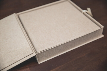 Beautiful beige linen high end coffe table book with matching box and thick pages