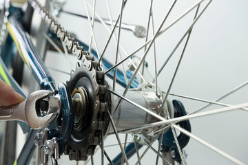 Fototapeta na wymiar close-up of Bicycle wheel and chain, repair concept, Bicycle travel