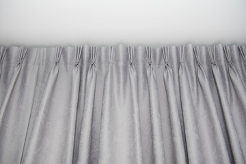 Luxury grey curtains with ring-top rail, Curtain interior decoration in living room.