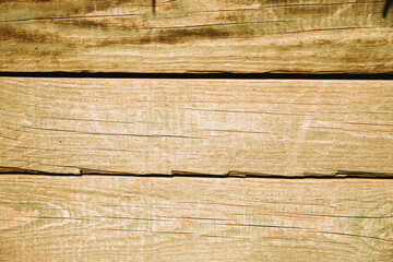 Old wooden planks.Boards with cracked relief and paint residue.
