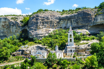Panorama of Assumption Cave Monastery & rock canyon, Bakhchysarai, Crimea. Complex was founded in VIII AD