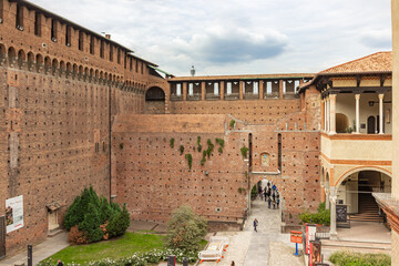 Fototapeta premium The inner courtyard of the Sforzesco Castle - Castello Sforzesco in Milan, Italy