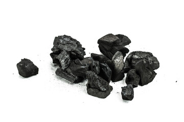 Many pieces of black charcoal isolated on white background.