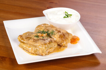 Homemade stuffed cabbage with cream
