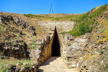 Entrance to antique crypt of Bosporan king or Royal Kurgan, Kerch, Crimea. Burial place was built about V BC. It has very unique construction in form of corbel arch © Poliorketes