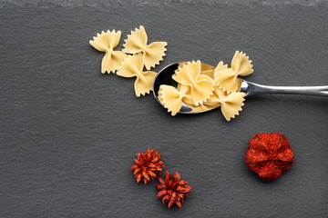 yellow noodles on dark background