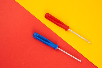 Fototapeta premium construction tools screwdrivers on double background repair equipment industry