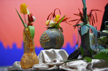 still life made of vegetables and fruits made with special knives for vegetables and fruits for exhibitions