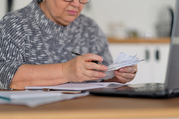 Old people, tax return and home banking. Worried senior lady paying federal taxes, doing family...
